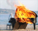 1205316521_news_burning_piano_man